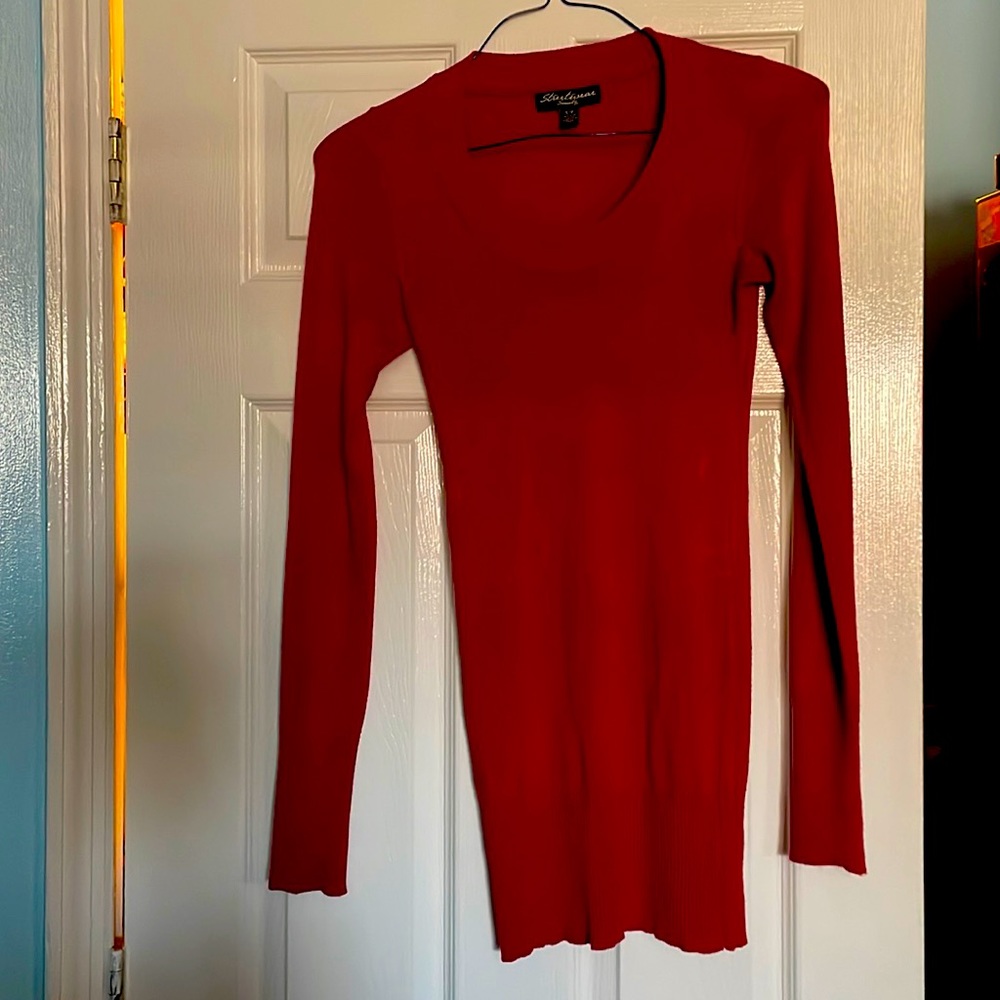 It's too small for me, the beautiful red color sweater.